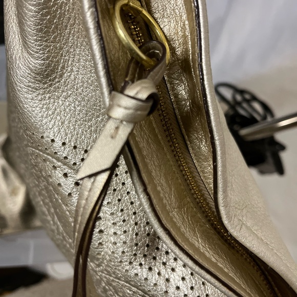 Coach gold crossbody bag.  Adjustable strap. - Picture 9 of 12